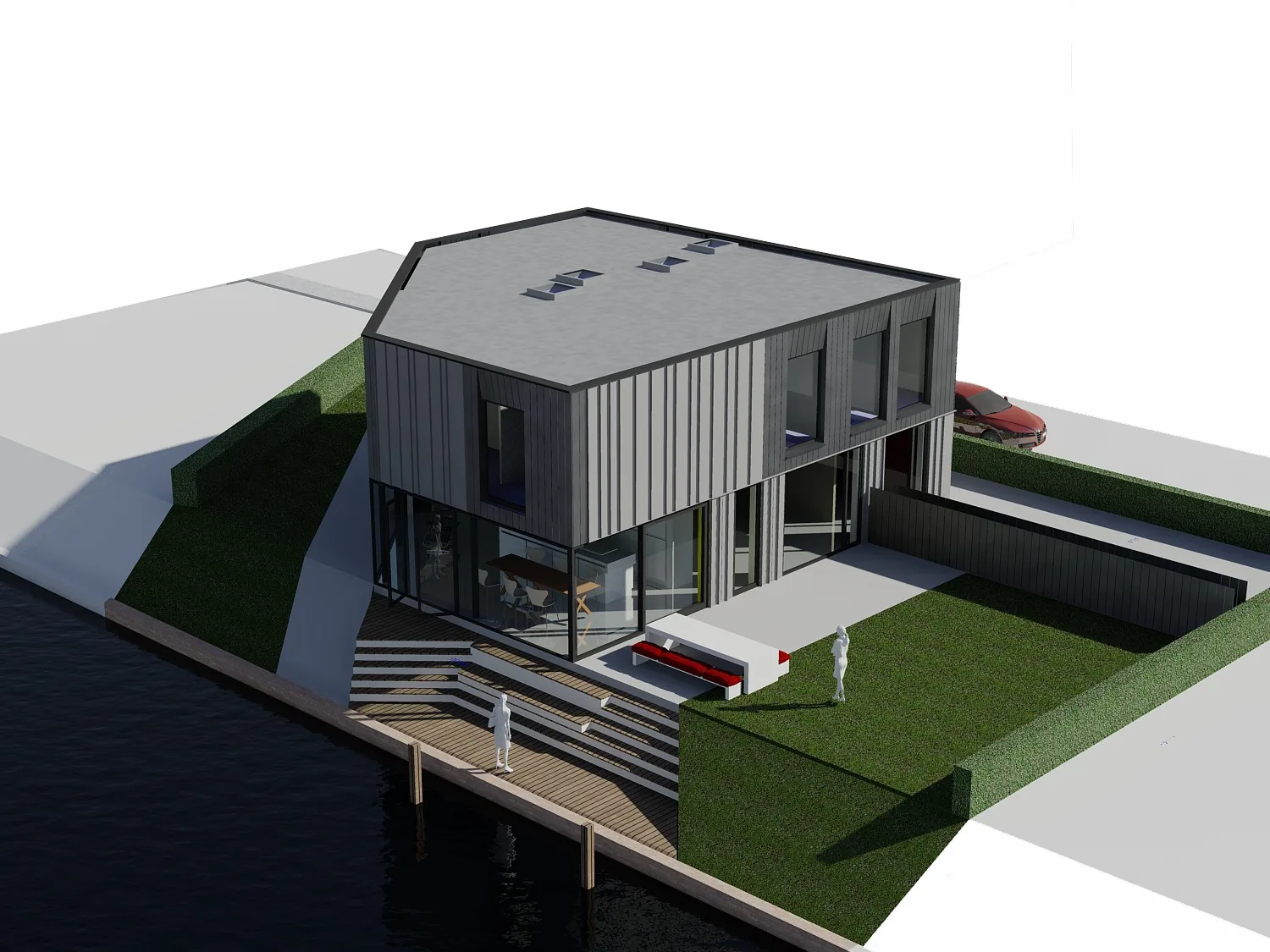 Bijgebouw met werkkamer en gastenverblijf naast de villa aan het water.